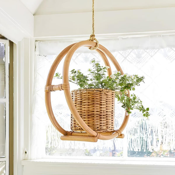 Rattan and cane hanging planters with trailing indoor plants by Akway