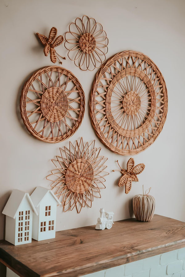 Rattan and bamboo wall decor and woven wall art hangings styled in a living room - Akway